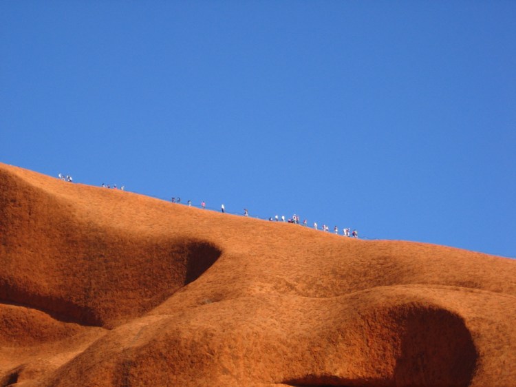 Climbers on Uluru, rplzzz